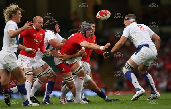 26.08.07 - Wales v France -  Wales' Alun-Wyn Jones loses possesion to France's Imanol Harinordoquy 
