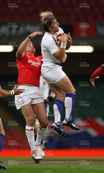 26.08.07 - Wales v France -  France's Cedric Heymans wins the ball from Wales' Jamie Robinson 
