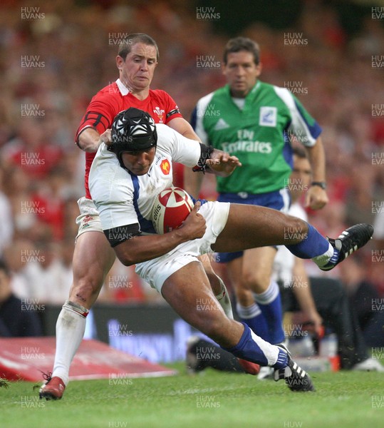 26.08.07 - Wales v France -  Wales' Shane Williams tackles France's Damien Traille 