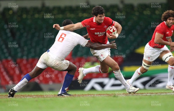 26.08.07 - Wales v France -  Wales' Mike Phillips is held by France's Serge Betsen 