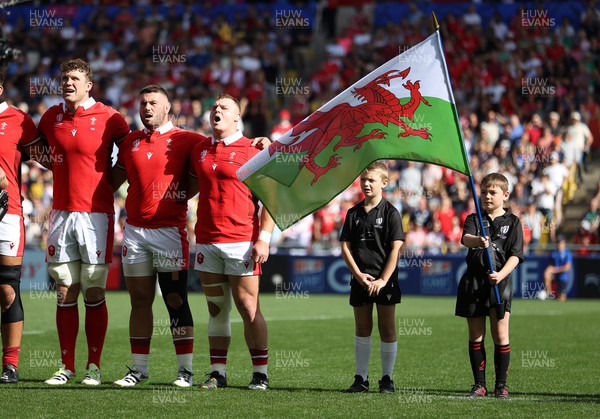 071023 - Wales v Georgia - Rugby World Cup, France 2023 - Pool C - Will Rowlands, Gareth Thomas and Dewi Lake of Wales sing the anthem