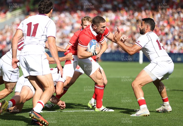 071023 - Wales v Georgia - Rugby World Cup, France 2023 - Pool C - George North of Wales is tackled by Lasha Khmaladze of Georgia 