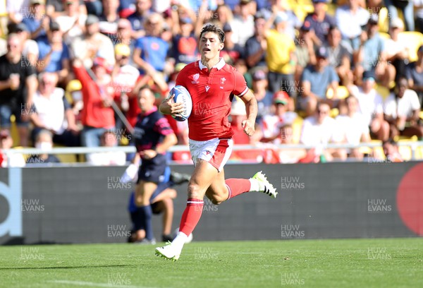 071023 - Wales v Georgia - Rugby World Cup, France 2023 - Pool C - Louis Rees-Zammit of Wales runs in to score a try