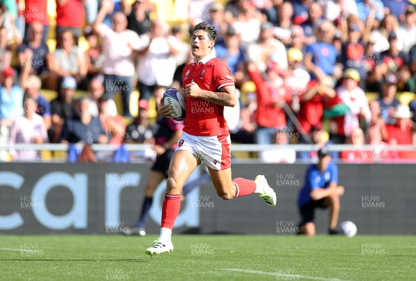 071023 - Wales v Georgia - Rugby World Cup, France 2023 - Pool C - Louis Rees-Zammit of Wales runs in to score a try