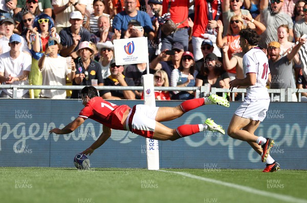 071023 - Wales v Georgia - Rugby World Cup, France 2023 - Pool C - Louis Rees-Zammit of Wales gathers the ball to score a try