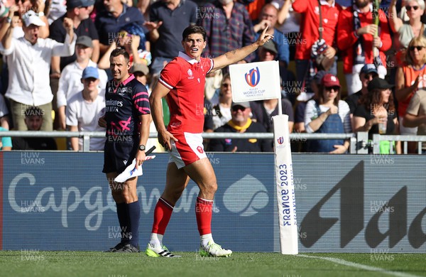 071023 - Wales v Georgia - Rugby World Cup, France 2023 - Pool C - Louis Rees-Zammit of Wales celebrates scoring a try