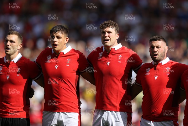 071023 - Wales v Georgia - Rugby World Cup, France 2023 - Pool C - George North, Dafydd Jenkins, Will Rowlands and Gareth Thomas of Wales sing the anthem