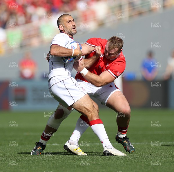 071023 - Wales v Georgia - Rugby World Cup, France 2023 - Pool C - Lasha Khmaladze of Georgia is tackled by Dewi Lake of Wales 