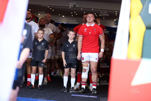 071023 - Wales v Georgia - Rugby World Cup, France 2023 - Pool C - Dewi Lake of Wales with the mascot in the tunnel