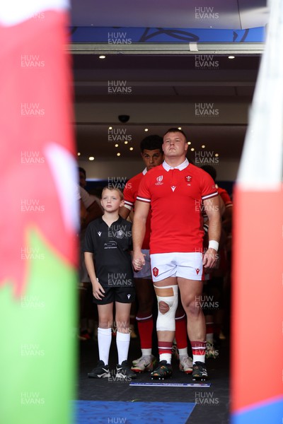 071023 - Wales v Georgia - Rugby World Cup, France 2023 - Pool C - Dewi Lake of Wales with the mascot in the tunnel