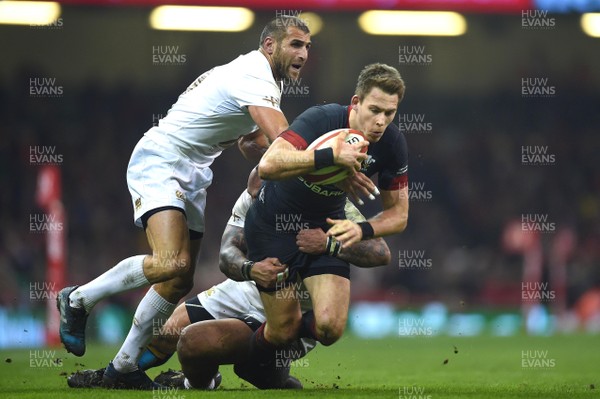 181117 - Wales v Georgia - Under Armour Series - Liam Williams of Wales is tackled by Lasha Khmaladze and Mikheil Nariashvili of Georgia