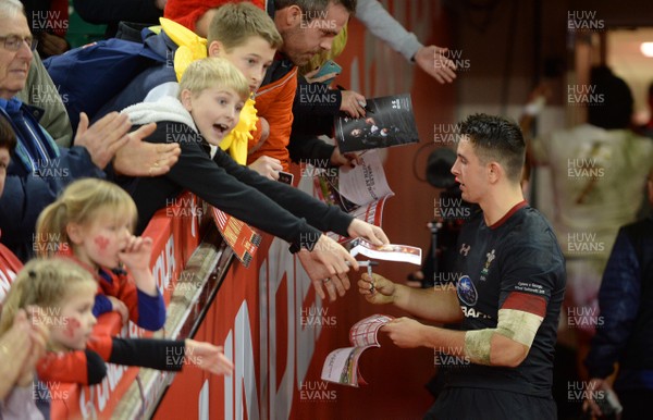 181117 - Wales v Georgia - Under Armour Series - Owen Watkin of Wales signs autographs at the end of the game