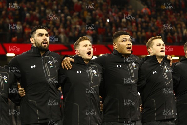 181117 Wales v Georgia - Under Armour 2017 Series -  Cory Hill(L) Elliott Dee Leon Brown and Hallam Amos of Wales sing the anthem