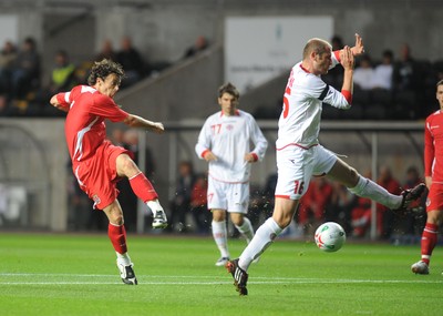 20.08.08 - International Football Friendly Wales v Georgia A shot from Wales' Simon Davies is blocked by Georgia's Malkhaz Asatiani 