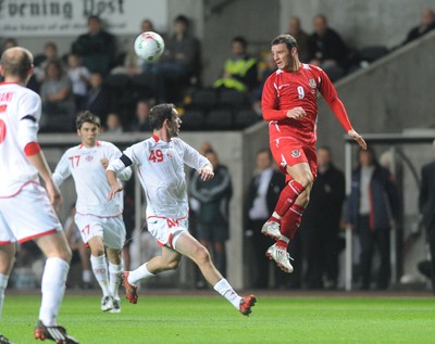 20.08.08 - International Football Friendly Wales v Georgia Wales' Jason Koumas heads over Georgia's David Odikadze 