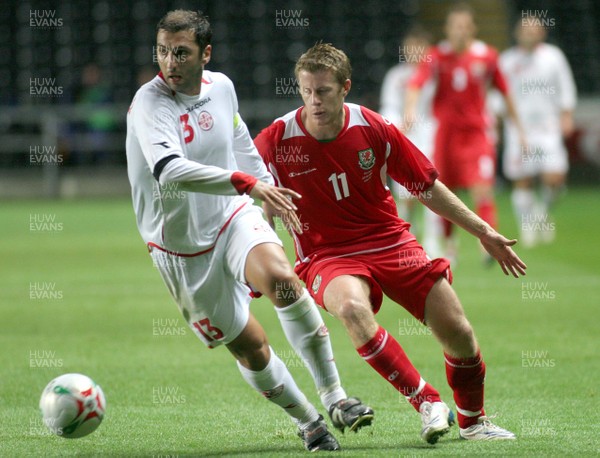 20.08.08 Wales vs. Georgia. Nationwide International Friendly. The Liberty Stadium, Swansea. Wales' Paul Parry(11) puts Georgia's Zurab Khizanishivili under pressure.  