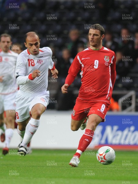 20.08.08 - International Football Friendly Wales v Georgia Wales' Jason Koumas is chased by Georgia's Zurab Khizanishvili 