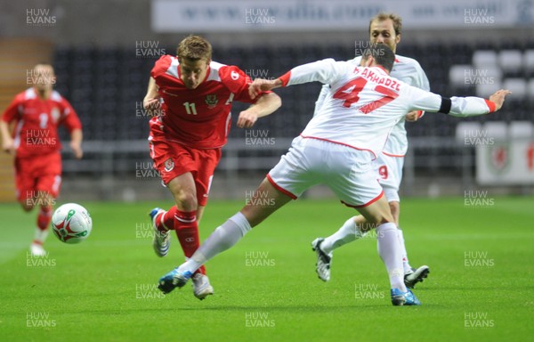 20.08.08 - International Football Friendly Wales v Georgia Wales' Paul Parry is challenged by Georgia's Aleksandre Kvakhadze 