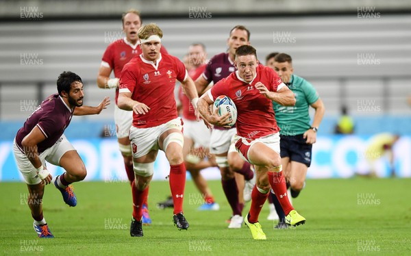230919 - Wales v Georgia - Rugby World Cup 2019 - Pool D - Josh Adams of Wales gets past Giorgi Kveseladze of Georgia to run in and score a try