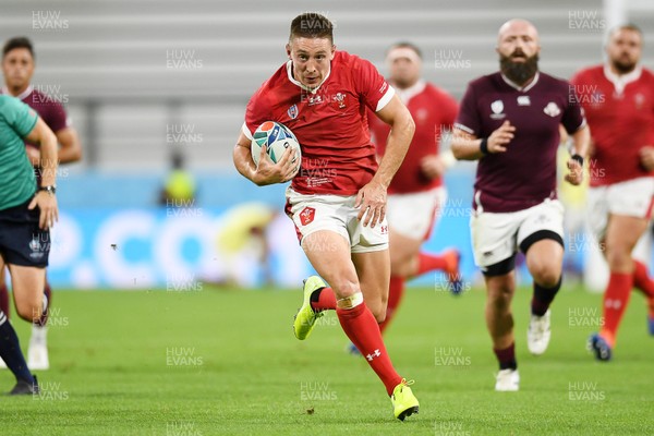 230919 - Wales v Georgia - Rugby World Cup 2019 - Pool D - Josh Adams of Wales gets past Giorgi Kveseladze of Georgia to run in and score a try