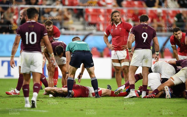 230919 - Wales v Georgia - Rugby World Cup 2019 - Pool D - Ken Owens of Wales goes down before medical staff get to him