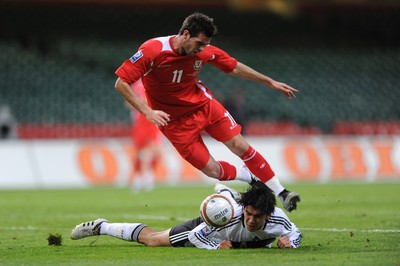 01.04.09 - Wales v Germany - 2010 FIFA World Cup Qualifying Group 4 - Wales' Joe Ledley is challenged by Germany's Serdar Tasci. 