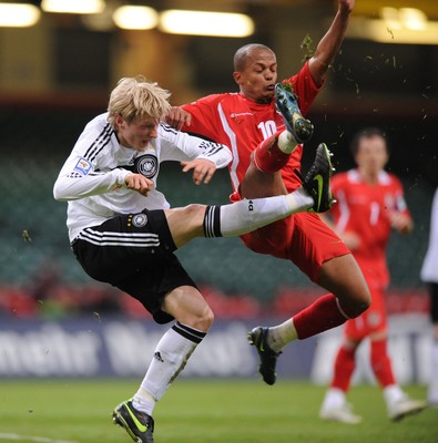 01.04.09 - Wales v Germany - 2010 FIFA World Cup Qualifying Group 4 - Wales' Rob Earnshaw puts pressure on Germany's Andreas Beck. 