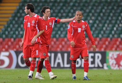 01.04.09 - Wales v Germany - 2010 FIFA World Cup Qualifying Group 4 - Wales' Joe Ledley, Simon Davies and Rob Earnshaw look dejected at the end of the game. 