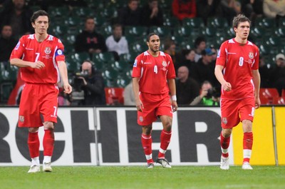 01.04.09 - Wales v Germany - World Cup 2010 - Qualifying Group 4 Wales' Ashley Williams (ctr) walks back after scoring an own goal 