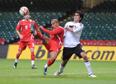 01.04.09 - Wales v Germany - World Cup 2010 - Qualifying Group 4 Wales' Rob Earnshaw is challenged by Germany's Serdar Tasci 