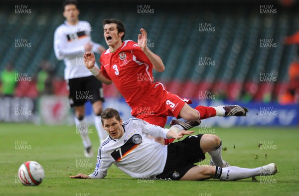 01.04.09 - Wales v Germany - 2010 FIFA World Cup Qualifying Group 4 - Wales' Gareth Bale is tackled by Germany's Bastian Schweinsteiger 