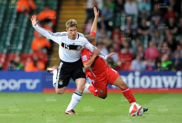 01.04.09 - Wales v Germany - 2010 FIFA World Cup Qualifying Group 4 - Wales' Rob Earnshaw is challenged by Germany's Thomas Hitzlsperger. 