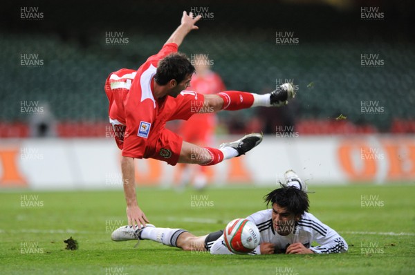 01.04.09 - Wales v Germany - 2010 FIFA World Cup Qualifying Group 4 - Wales' Joe Ledley is challenged by Germany's Serdar Tasci. 