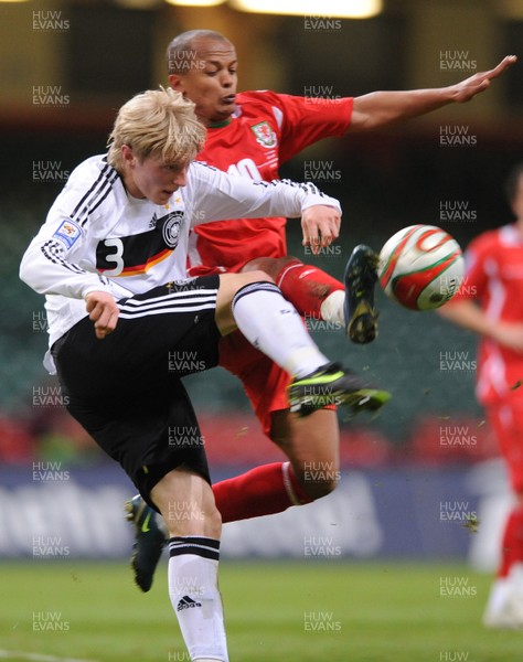 01.04.09 - Wales v Germany - 2010 FIFA World Cup Qualifying Group 4 - Wales' Rob Earnshaw puts pressure on Germany's Andreas Beck. 