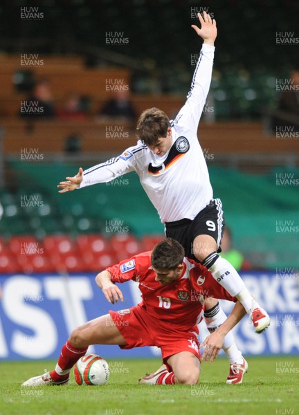 01.04.09 - Wales v Germany - 2010 FIFA World Cup Qualifying Group 4 - Wales' Ched Evans is tackled by Germany's Patrick Helmes. 