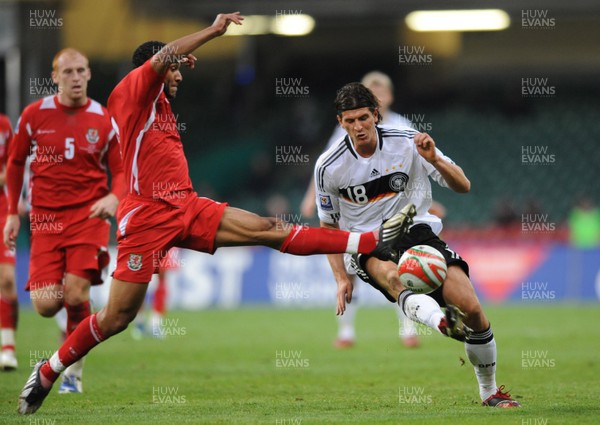 01.04.09 - Wales v Germany - 2010 FIFA World Cup Qualifying Group 4 - Germany's Mario Gomez is tackled by Ashley Williams. 