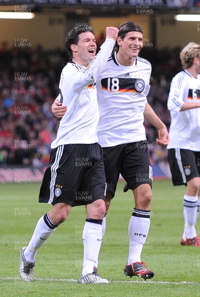 01.04.09 - Wales v Germany - World Cup 2010 - Qualifying Group 4 Germany's Michael Ballack (L) celebrates with  Mario Gomez after scoring goal 