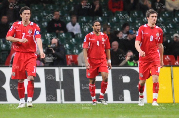 01.04.09 - Wales v Germany - World Cup 2010 - Qualifying Group 4 Wales' Ashley Williams (ctr) walks back after scoring an own goal 