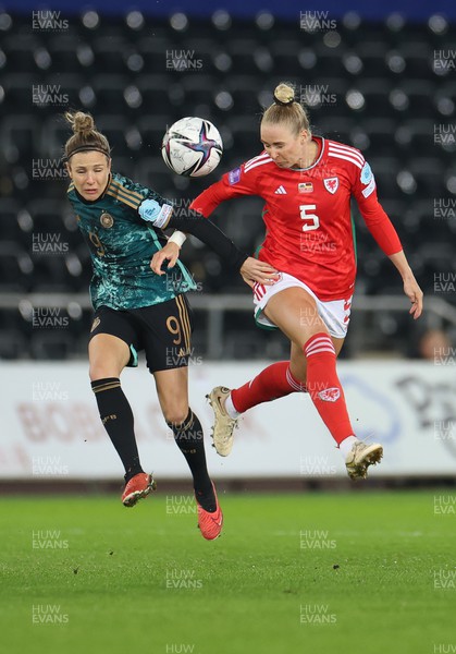 051223  - Wales v Germany, UEFA Women’s Nations League - Rhiannon Roberts of Wales and Svenja Huth of Germany compete for the ball