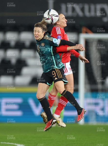 051223  - Wales v Germany, UEFA Women’s Nations League - Svenja Huth of Germany and Josephine Green of Wales compete for the ball