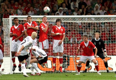 08.09.07 - Euro 2008 Qualifying, Group D Wales v Gemany Germany's Bastian Schweinsteiger fires a freekick over the Welsh defence 