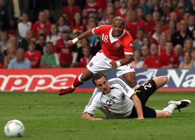 08.09.07 - Euro 2008 Qualifying, Group D Wales v Gemany Wales' Rob Earnshaw tries to get a shot on target as Germany's Christoph Metzelder cahllenges 