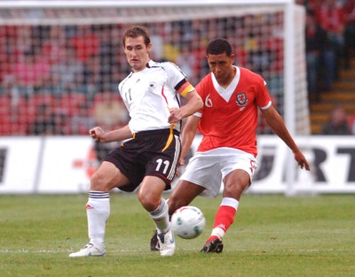 08.09.07 - Euro 2008 Qualifying, Group D Wales v Gemany Germany's Miroslav Klose is challenged by Wales' Lewin Nyatanga 