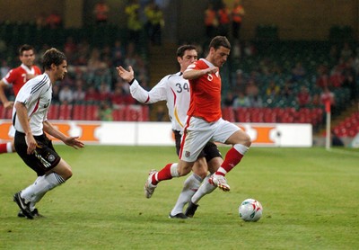 08.09.07 - Euro 2008 Qualifying, Group D Wales v Gemany Wales' Jason Koumas tries to get past Germany's Roberto Hilbert 