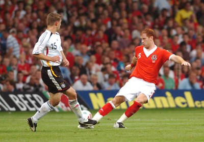 08.09.07 - Euro 2008 Qualifying, Group D Wales v Gemany Wales' James Collins tries to get the ball past Germany's Thomas Hizlsperger 