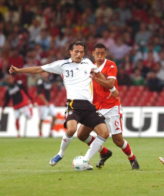 08.09.07 - Euro 2008 Qualifying, Group D Wales v Gemany Germany's Kevin Kuranyi is challenged by Wales' Lewin Nyatanga 