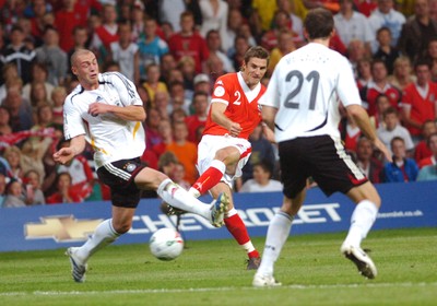 08.09.07 - Euro 2008 Qualifying, Group D Wales v Gemany Wales' Sam Ricketts tries to get a shot past Germany's Christian Pander (L) and Christoph Metzelder 