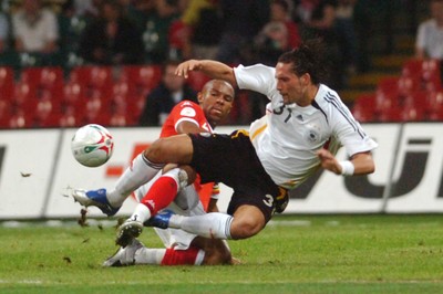 08.09.07 - Euro 2008 Qualifying, Group D Wales v Gemany Germany's Kevin Kuranyi is brought down by a tackle by Wales' Danny Gabbidon 