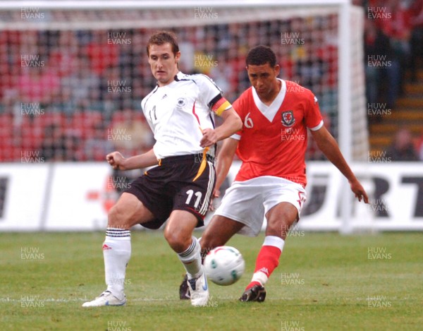 08.09.07 - Euro 2008 Qualifying, Group D Wales v Gemany Germany's Miroslav Klose is challenged by Wales' Lewin Nyatanga 
