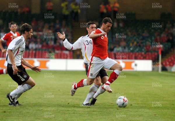 08.09.07 - Euro 2008 Qualifying, Group D Wales v Gemany Wales' Jason Koumas tries to get past Germany's Roberto Hilbert 
